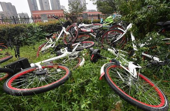 武漢部分路段將禁停共享單車 亂停亂放企業(yè)限制投放_(tái)新浪湖北_新浪網(wǎng)